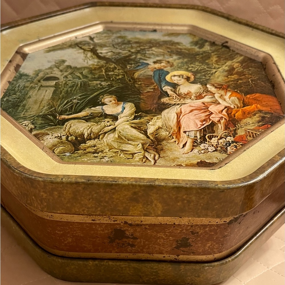 Vintage tin filled with vintage sewing supplies